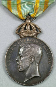 Silver King Gustav V Medal, with reverse inscribed "Femte Olympiaden Stockholm 1912", and pale blue & yellow ribbon. In original box, together with original citation from the Royal Palace to "Commander Athletics, W.B.Alexander, Esq", with a translation. E