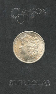 1882 cased Carson City Morgan silver dollar. From part of the hoard discovered during a 1964 Treasury Audit. Selling regularly on USA e-bay at $150 to $300. With USA Government numbered certificate.