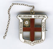 MELBOURNE HOSPITAL, 15ct gold & enamel badge Melbourne Hospital/ Miseris Succurrere Disco", engraved on reverse "M.V.Gooden, 2'7'23". Weight 8.89 grams.