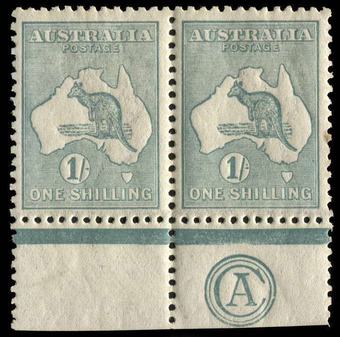 1/- Bright Blue-Green, CA MONOGRAM pair; nicely centred & fine frontal appearance but with partially toned gum and a couple of toned perfs. BW:32za. MUH.