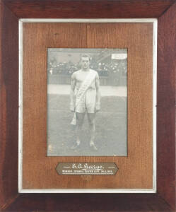 1913 STAWELL GIFT: Original photograph window mounted with hand-painted caption "E.A.George, Winner - Stawell Easter Gift 24.3.1913", in contemporary frame & glazed, overall 63x75cm. Good condition.