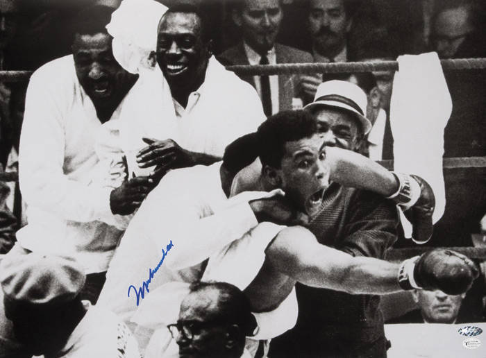 MUHAMMAD ALI, signed photograph from the Muhammad Ali vs Sonny Liston fight, February 25th 1964, size 51x36cm. With 'Online Authentics' No.12843.