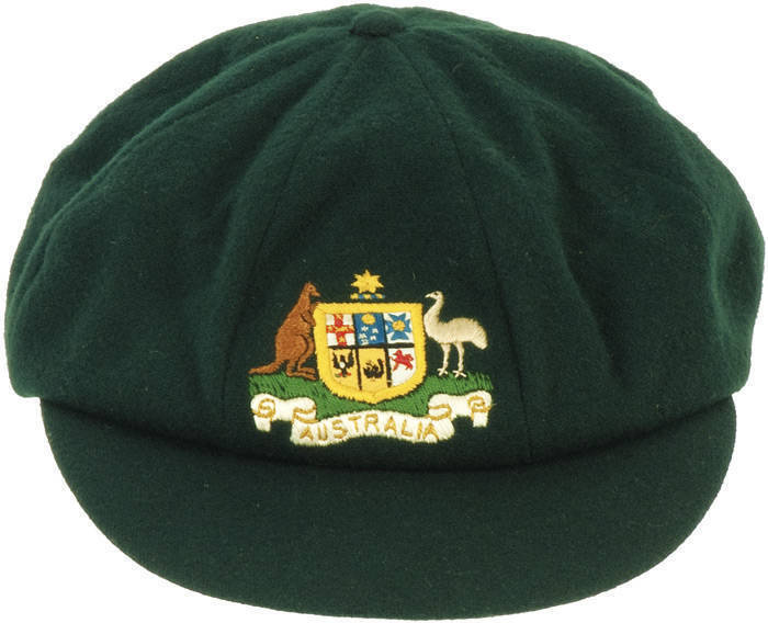 BILL WOODFULL'S AUSTRALIAN "BAGGY GREEN" TEST CAP, green wool, with embroidered Coat-of-Arms that is different to all others (similar to 1963-64). This cap bears the official Australian Coat of Arms, as set out in the 1912 Royal Warrant. It carries the ka