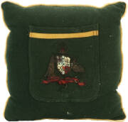 BILL WOODFULL'S BLAZER POCKET, from c1928-29 Ashes Series, green wool, yellow silk trim, wire-embroidered Coat-of-Arms, made into a small cushion with other parts of the blazer. Fair condition (few moth-holes & faults).