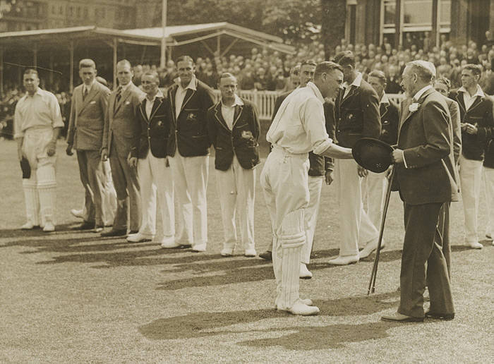 BILL WOODFULL'S 1930 ASHES TOUR PHOTOGRAPH ALBUM: Large Photograph Album, very well annotated by Woodfull, with photographs (207), the highlight, a photograph of Don Bradman walking out to bat at Leeds (for his record 334), signed & endorsed "To Billy Woo