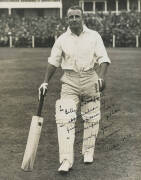 BILL WOODFULL'S 1930 ASHES TOUR PHOTOGRAPH ALBUM: Large Photograph Album, very well annotated by Woodfull, with photographs (207), the highlight, a photograph of Don Bradman walking out to bat at Leeds (for his record 334), signed & endorsed "To Billy Woo - 5