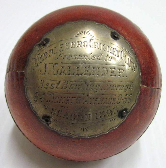 CRICKET BALL, with engraved plaque affixed "Middlesbro Cricket Club, Presented to J.Callender, Best Bowling Average, 64 Wickets Average 9.55, Season 1893".