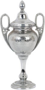 PRESENTATION CUP, two-handled cup, with lid, 43cm tall, engraved on one side "Won By Norseman Cricket Club, Premiers 1909-10", and engraved on other side "Presented To Norseman Cricket Association, By Boulder City Brewery Co.Ltd".