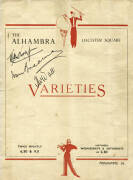 1934 AUSTRALIAN TOUR TO ENGLAND: Theatre programme from The Alhambra in Leicester Square, signed to front cover by Bill Woodfull, Don Bradman & Tim Wall. Some faults though scarce.