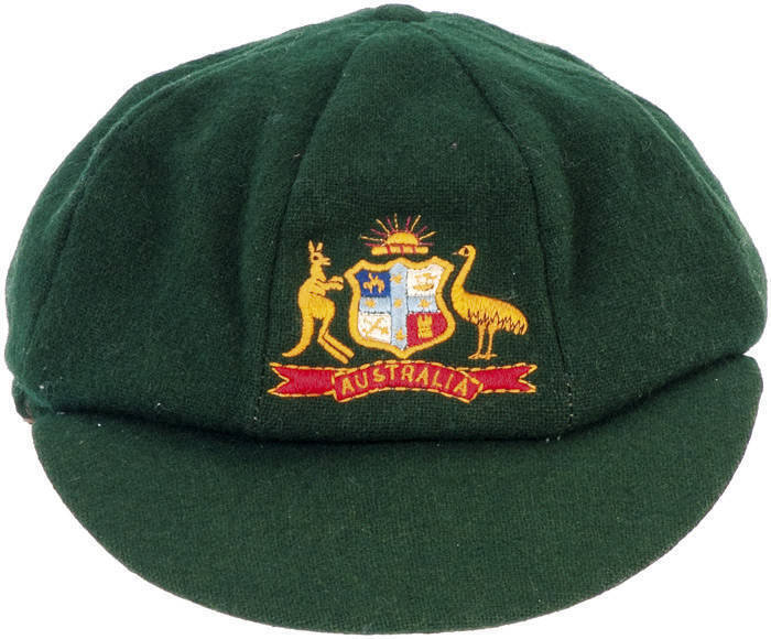 AUSTRALIAN "BAGGY GREEN" TEST CAP, green wool, embroidered Australian Coat-of-Arms on front, made by Albion, player unknown. Fine condition. Ex Bob Hooper, assistant manager of Australian Cricket Team.