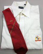 AUSTRALIAN CRICKETER'S CLOTHING: "Ganton" Business Shirt with embroidered Australian Coat-of-Arms on left pocket; Australian team tie (red); plus trousers. Fine condition.