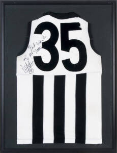 PETER DAICOS (Collingwood), signature & endorsement on Collingwood football jumper, framed & glazed, overall 71x93cm.