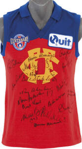 FITZROY: 1996 Fitzroy jumper signed by "Fitzroy Football Club - Team of our Century 1897-1996" inductees & nominees, 18 signatures including Brad Boyd, Allen Ruthven, Kevin Murray, Bill Stephen, Bernie Quinlan & Alastair Lynch. With page identifying signa