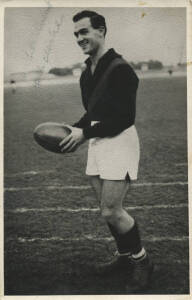 c1965 Prouds Paint "VFL Footballer Postcard" showing Jack Clarke (Essendon), with faded Jack Clarke signature on front. G/VG. Rare.