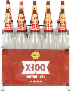 SHELL X-100 Oil Rack with 10 Quarts Bottles and Tin Tops with matching rack signage. Included are; 10, 20/20, 30(x4), 40(x2) and 50(x2) weight tops (with lids) in good to very good condition. A rare and outstanding set, seldom seen.