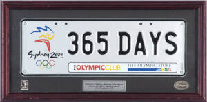 COMMEMORATIVE NUMBER PLATE, "Sydney 2000, 365 DAYS, The Olympic Club", manfacturer's original strike off, limited to production of 150, framed & glazed, overall 46x23cm. With CoA.