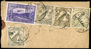 1935 (SG.204) £2 Bulolo Goldfields Airmail, VFU in combination with Undated Bird Airmail 3d, plus 1/-, 5/- & £1 Postage on a gold bullion shipment parcel tag or label, cancelled at SALAMAUA (5FE37). This was the purpose for which these high denomination (