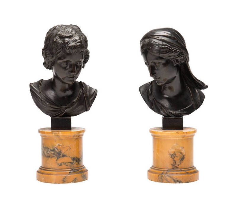 A pair of bronze busts on coloured alabaster bases. Tallest 24cm