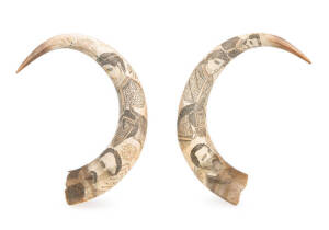 Pair of scrimshaw cow horns carved with various portraits & horses. 19th century. Approx. 37cm each