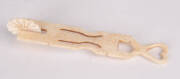 An antique whalebone pastry crimper with love heart finial, 19th century 15.8cm long