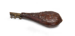 Embossed leather powder flask, 19th century. 24cm