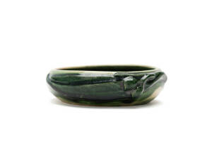 MERRIC BOYD: Pottery bowl with applied gumnuts & leaves glazed in green, signed & dated 1930. Width 13cm