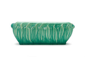 MELROSE pottery green glazed flower trough decorated with gum leaves. Length 35cm