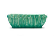 MELROSE pottery green glazed flower trough decorated with gum leaves. Length 35cm