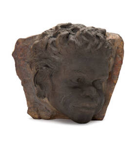 WILLIAM RICKETTS: Pottery face mask wall plaque mounted on jasper slab. 18 x 15cm&nbsp;