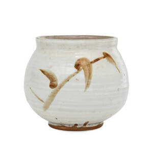 HAROLD HUGHAN: Pottery vase, cream glazed with underglazed brown leaf decoration. Early signature & monogram. 14cm