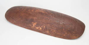 Coolamon: Western Queensland origin with incised decoration, 75cm.