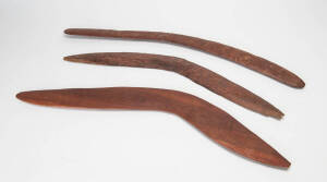 BOOMERANGS: Group of three West Australian boomerangs with ochre finish. 60 to 70cm.