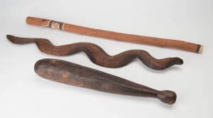 TRIBAL ARTIFACTS: Club with poker work decoration (47cm), carved snake (77cm) &nbsp;and painted miniature didgeridoo (80cm). 3 items.&nbsp;
