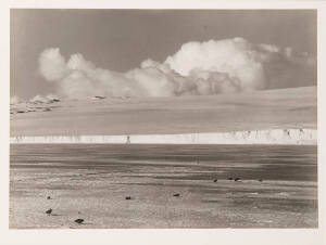 HERBERT GEORGE PONTING (1870 - 1935)&nbsp;Cumulus Clouds rising up over Barne Glacier&nbsp;the photographer's blindstamp "H.G. Ponting" in lower right margin carbon print, 49.5 x 65.3cm numbered "105" on the Fine Art Society label on the reverse&nbsp;