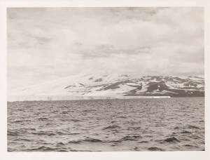 HERBERT GEORGE PONTING (1870 - 1935)&nbsp;Face of the Great Ice Barrier and Mount Terror&nbsp;the photographer's blindstamp "H.G. Ponting" in lower right margin carbon print, 49.5 x 65.3cm numbered "20" on the Fine Art Society label on the reverse&nbsp;