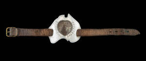Wrist band sweet heart charm belonging to (2648) C.S.Preiss, 3rd Light Horse Regiment. Tin, copper & leather, c1916
