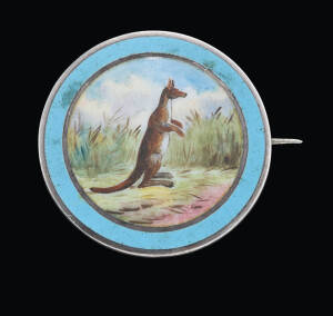 A silver and enamel Kangaroo brooch, diameter 2.3 cm.