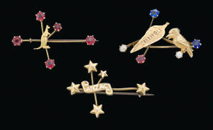 Three gold Southern Cross Brooches, circa 1915, comprising an Anzac brooch and a kangaroo brooch by Willis, Melbourne together with a Gallipoli brooch by Alfred T. Jackson, Fremantle.