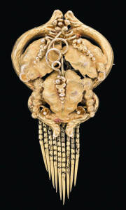A gold tassle brooch, Lamborn and Wagner, Melbourne, circa 1875. (Reference p.212 Australian Jewellery, 19th & 20th Century, Anne Schofield, Kevin Fahy) One tassle deficient.