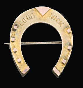 A horseshoe brooch, Wendt, Adelaide, circa 1880, marked 9ct, width 2.5cm.