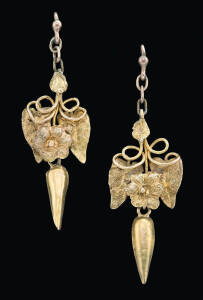A pair of gold botanical earrings, length of drop 3cm.(Reference p.306 Australian Jewellers, Cavill, Cocks & Grace)