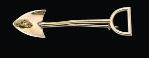 A goldfields brooch, diamond set nugget, yellow gold, length 4.9cm. (Similar example lot 389, sold June 3, 2014, Mossgreen Australian & Colonial Antique & Historical)