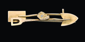 A Miner's brooch, spade, shovel and diamond set nugget, yellow gold, length 4.2cm.