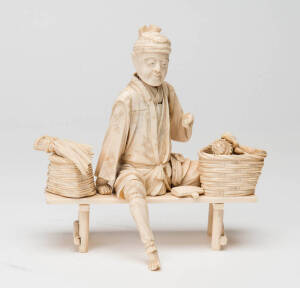 Meiji Japanese ivory okimono of a farmer. 17cm.