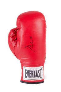 MUHAMMAD ALI, signature on 'Everlast' boxing glove. With 'Online Authentics' No.OA-7847287.