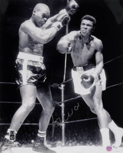 MUHAMMAD ALI, signed photograph from the Muhammad Ali vs Doug Jones fight, March 13th 1963, size 40x51cm. With 'Online Authentics' No.OA-8090289.