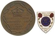 1958 BRITISH COMMONWEALTH GAMES IN CARDIFF, Participation Medal "1958 VI.British Empire and Commonwealth Games, Cardiff, Wales", 55mm diameter; plus England team lapel badge. Ex Francis Joseph Coyne MBE. 