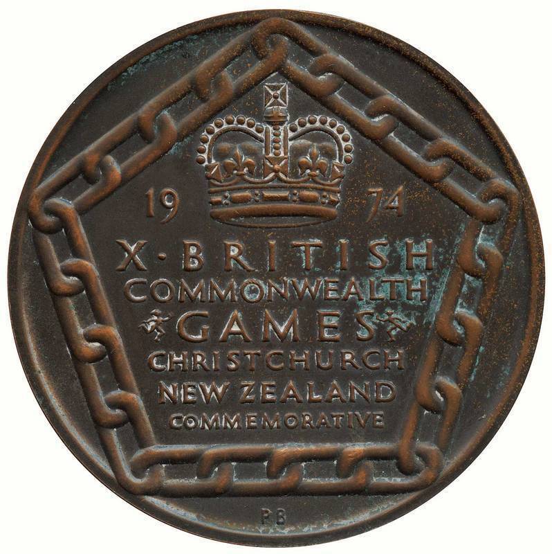 1974 COMMONWEALTH GAMES IN CHRISTCHURCH, Participation Medal, 63mm diameter; plus a small NZ tiki. Ex Francis Joseph Coyne MBE.