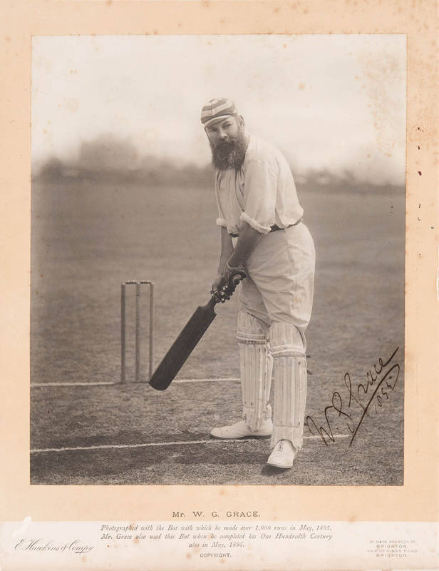 W.G.GRACE, fine signature dated "1895" on original photograph, showing him full-length batting, by E.Hawkins of Brighton, with title "Mr.W.G.Grace. Photographed with the Bat with which he made over 1,000 runs in May 1895. Mr.Grace also used this Bat when