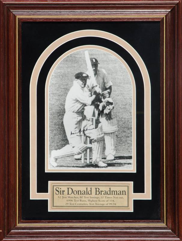 DON BRADMAN, signed photograph, window mounted, framed & glazed, overall 30x40cm.